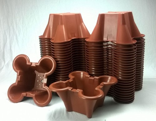 https://ezgrogarden.com/wp-content/uploads/2018/05/EzGro-Quad-Pots-50-Pack-Terracotta-500w.jpg